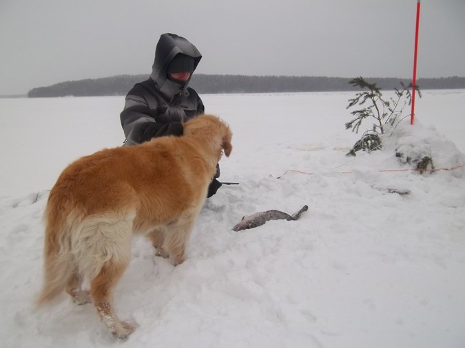 The
blind lead the blind as I teach Itta the finer points of
fishing.